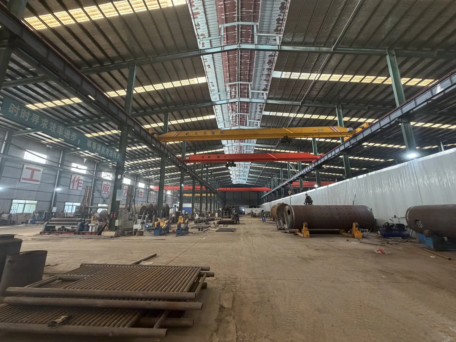 JINHONG boiler manufacturing workshop with cranes, boiler shells and pressure components