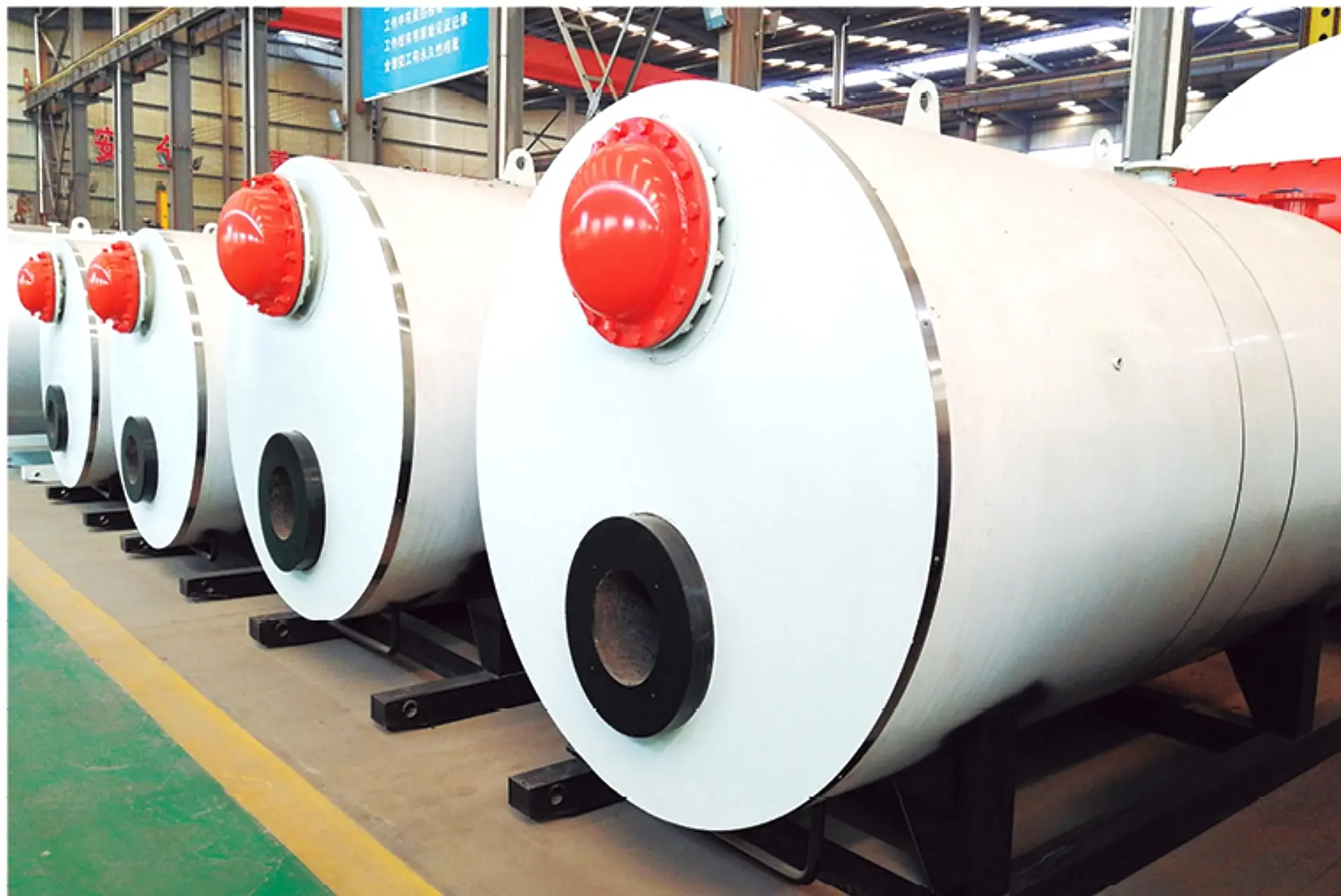 Real JINHONG ZKS horizontal vacuum hot water boiler bodies arranged in the manufacturing workshop