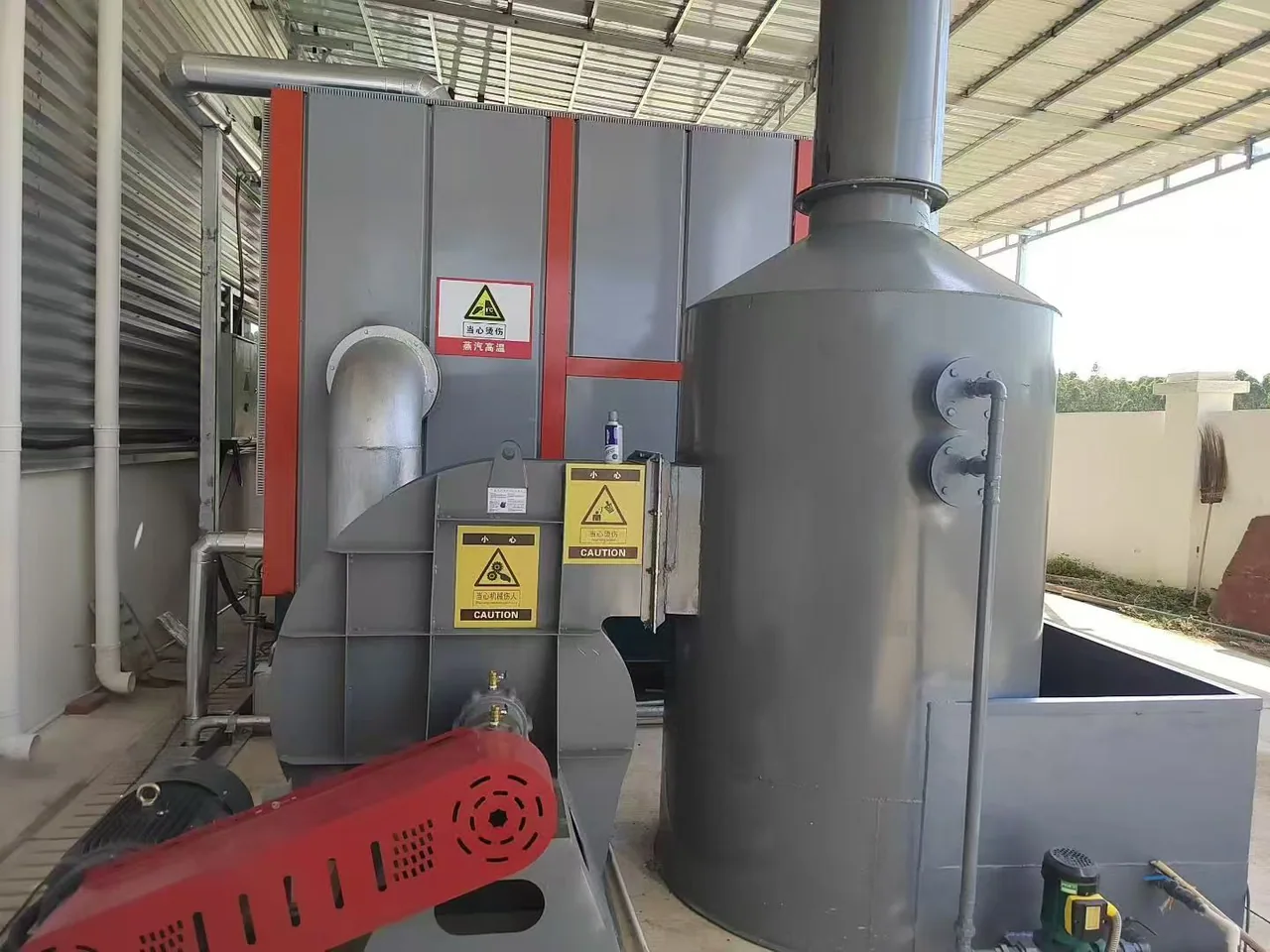 Flue-gas side of the Bangladesh biomass steam generator with ducting, induced-draft fan and wet dust collection equipment